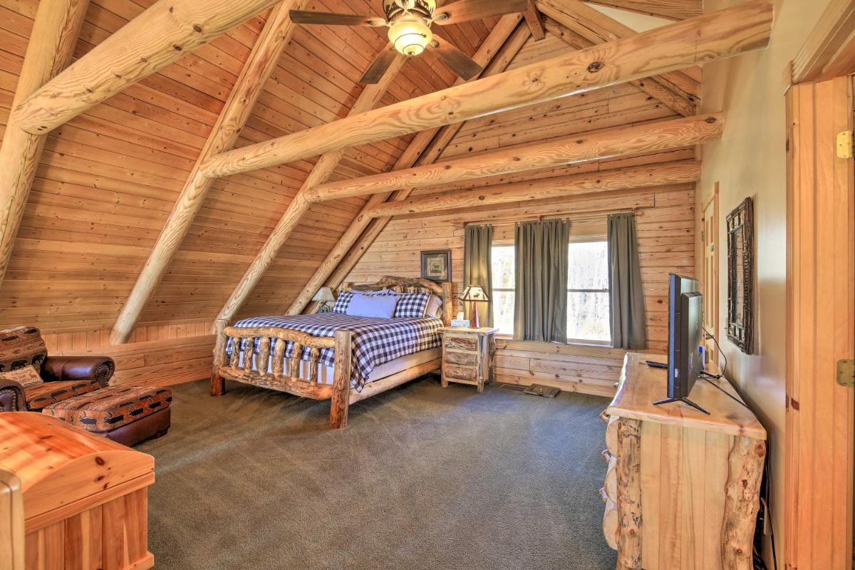 Lansing Cabin with 2 Huge Wraparound Decks and Hot Tub - Housity