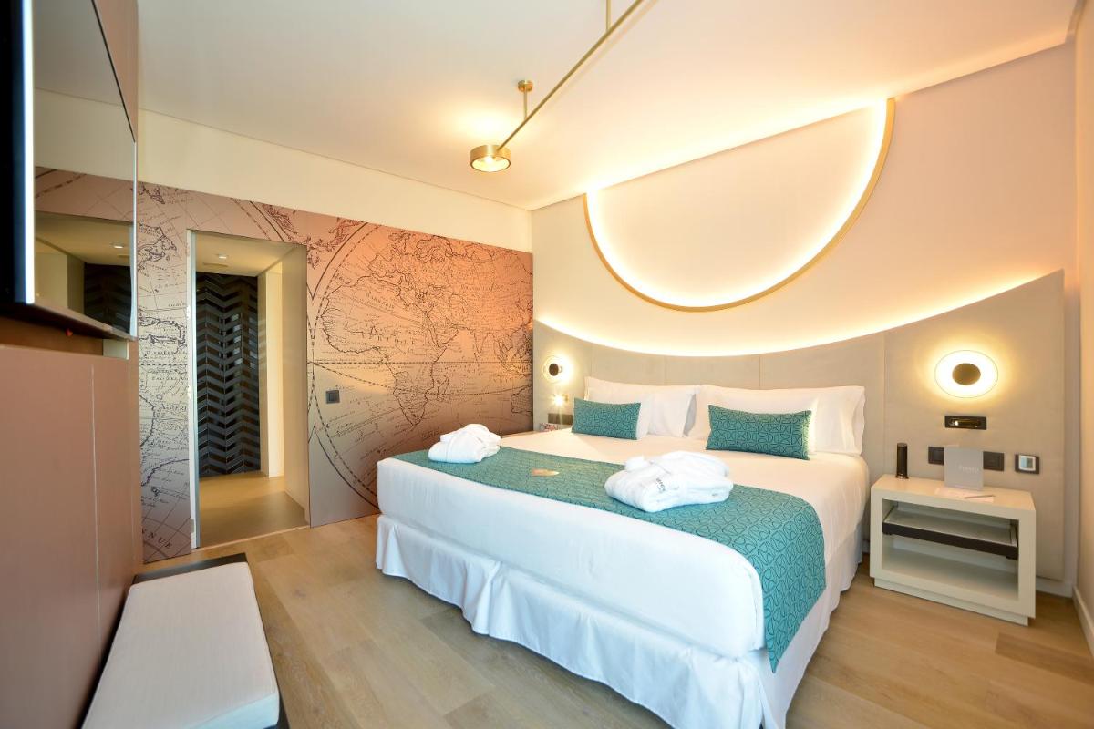 Cama o camas de una habitación en Barceló Sevilla Renacimiento
