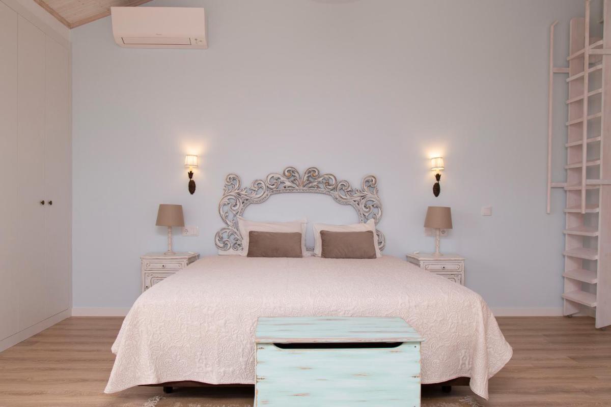 Uma cama ou camas num quarto em Aires da Serra Hotel