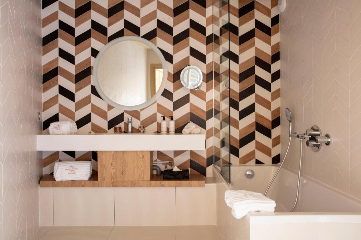 Salle de bains dans l'établissement Grandes Rousses Hotel & Spa