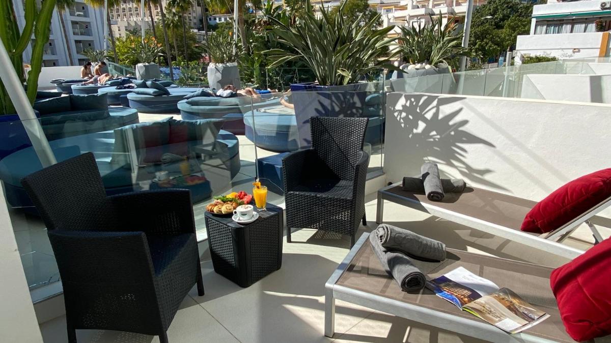 Zona de estar de Essence Hotel Boutique