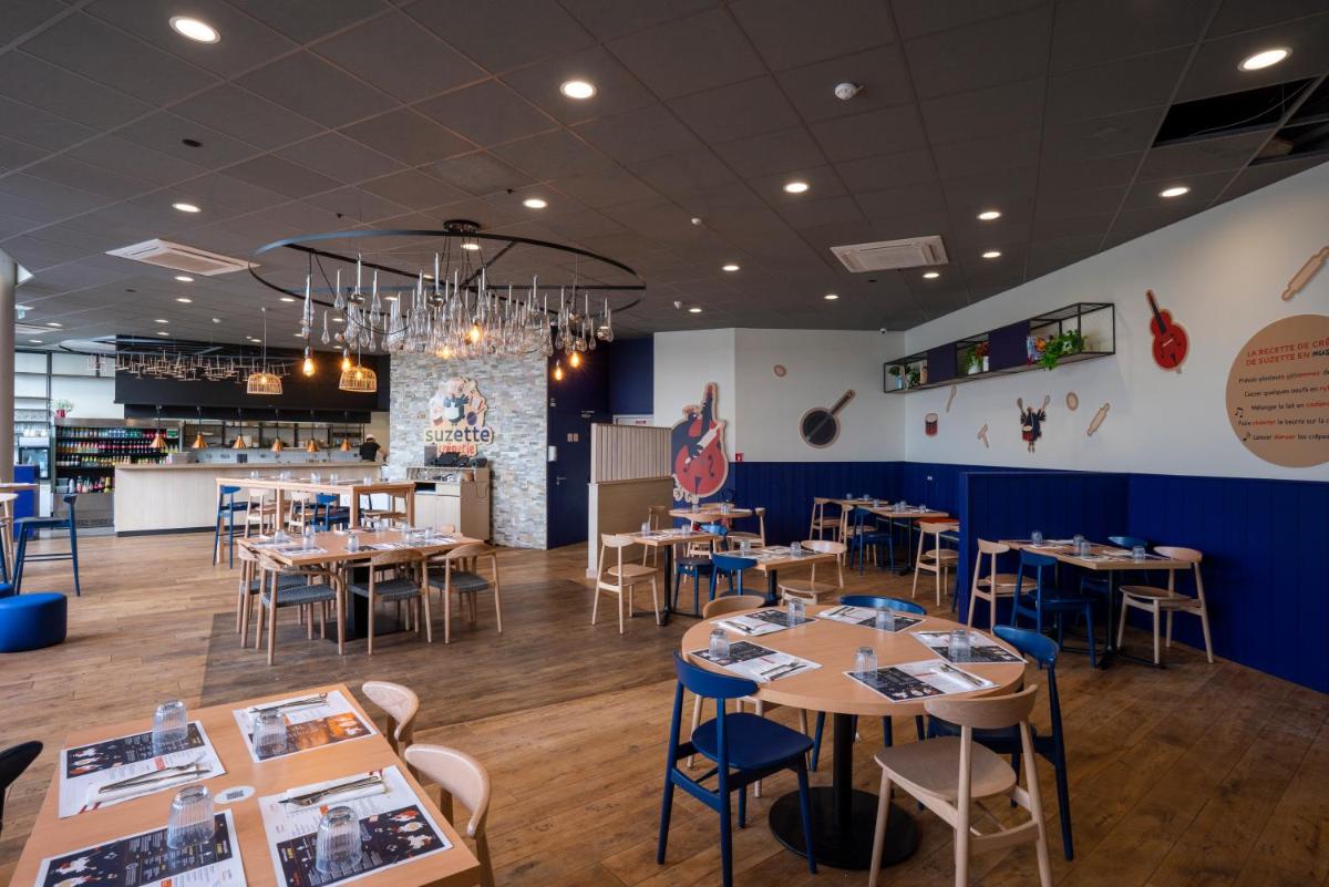 Un restaurante o sitio para comer en Center Parcs Villages Nature Paris
