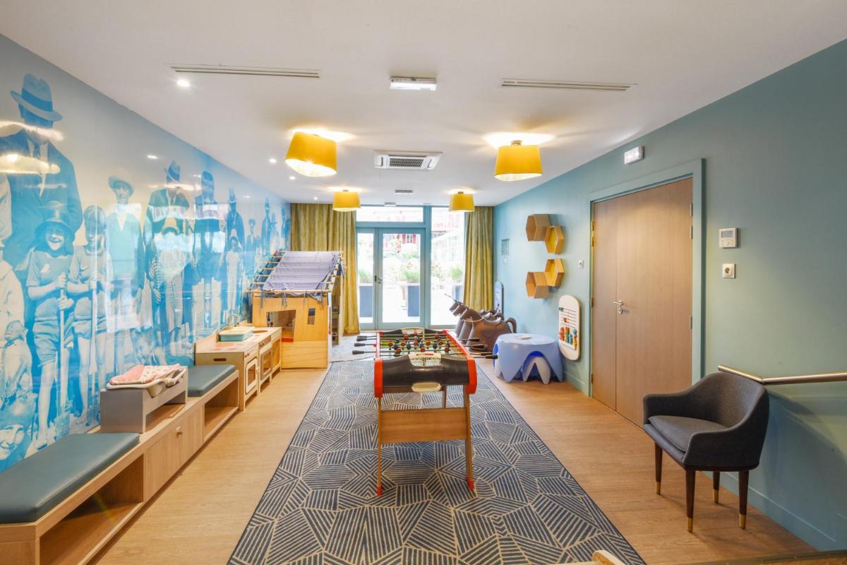 Coin salon dans l'établissement Résidence Pierre & Vacances Premium Presqu'Ile de la Touques