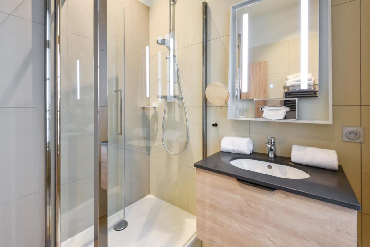 Salle de bains dans l'établissement Résidence Pierre & Vacances Premium Presqu'Ile de la Touques