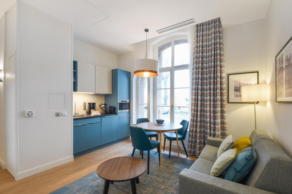 Cuisine ou kitchenette dans l'établissement Résidence Pierre & Vacances Premium Presqu'Ile de la Touques