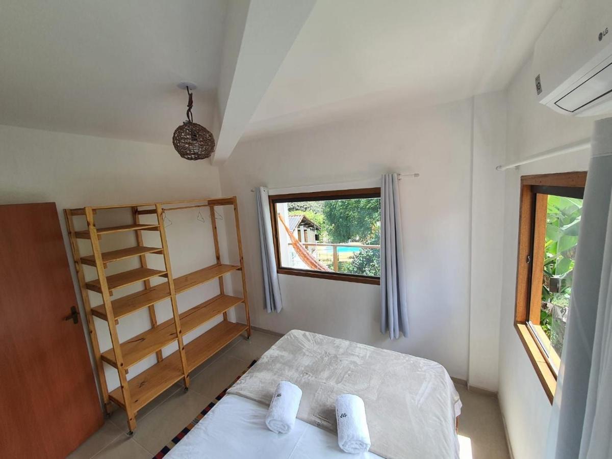 Vila Pitangueira - Apto Laranja - No Centro de Serra Grande com Piscina, Jacuzzi, Internet Veloz - Housity