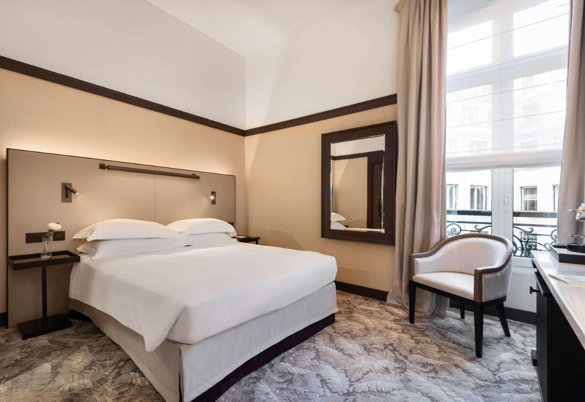 Un ou plusieurs lits dans un hébergement de l'établissement Hyatt Paris Madeleine