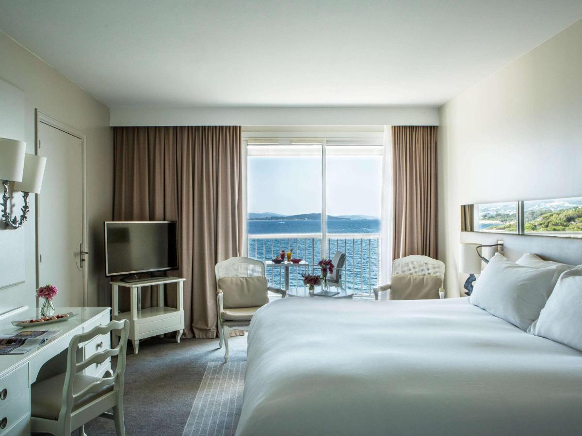 Un ou plusieurs lits dans un hébergement de l'établissement Sofitel Golfe d'Ajaccio Thalassa Sea & Spa