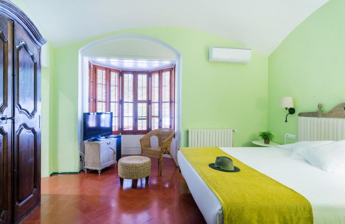 Cama o camas de una habitación en Mas Ses Vinyes - Adults Only