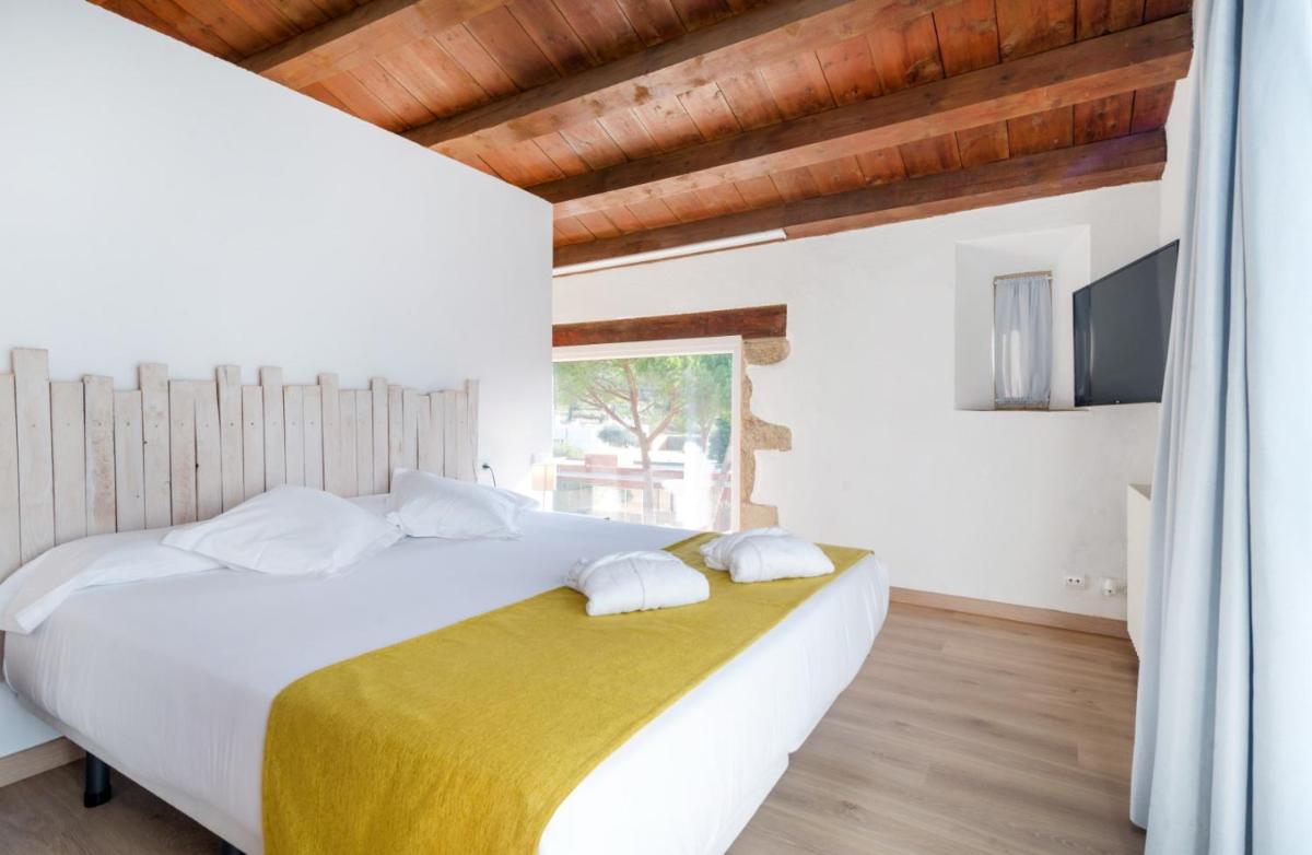 Cama o camas de una habitación en Mas Ses Vinyes - Adults Only