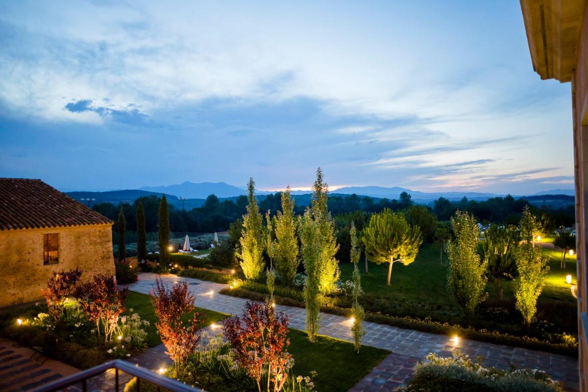 Jardín al aire libre en Casa Anamaria Hotel