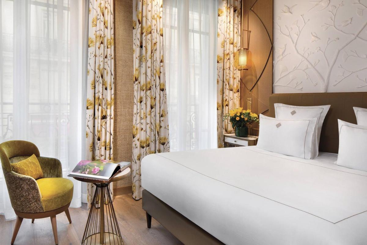 Un ou plusieurs lits dans un hébergement de l'établissement La Demeure Montaigne