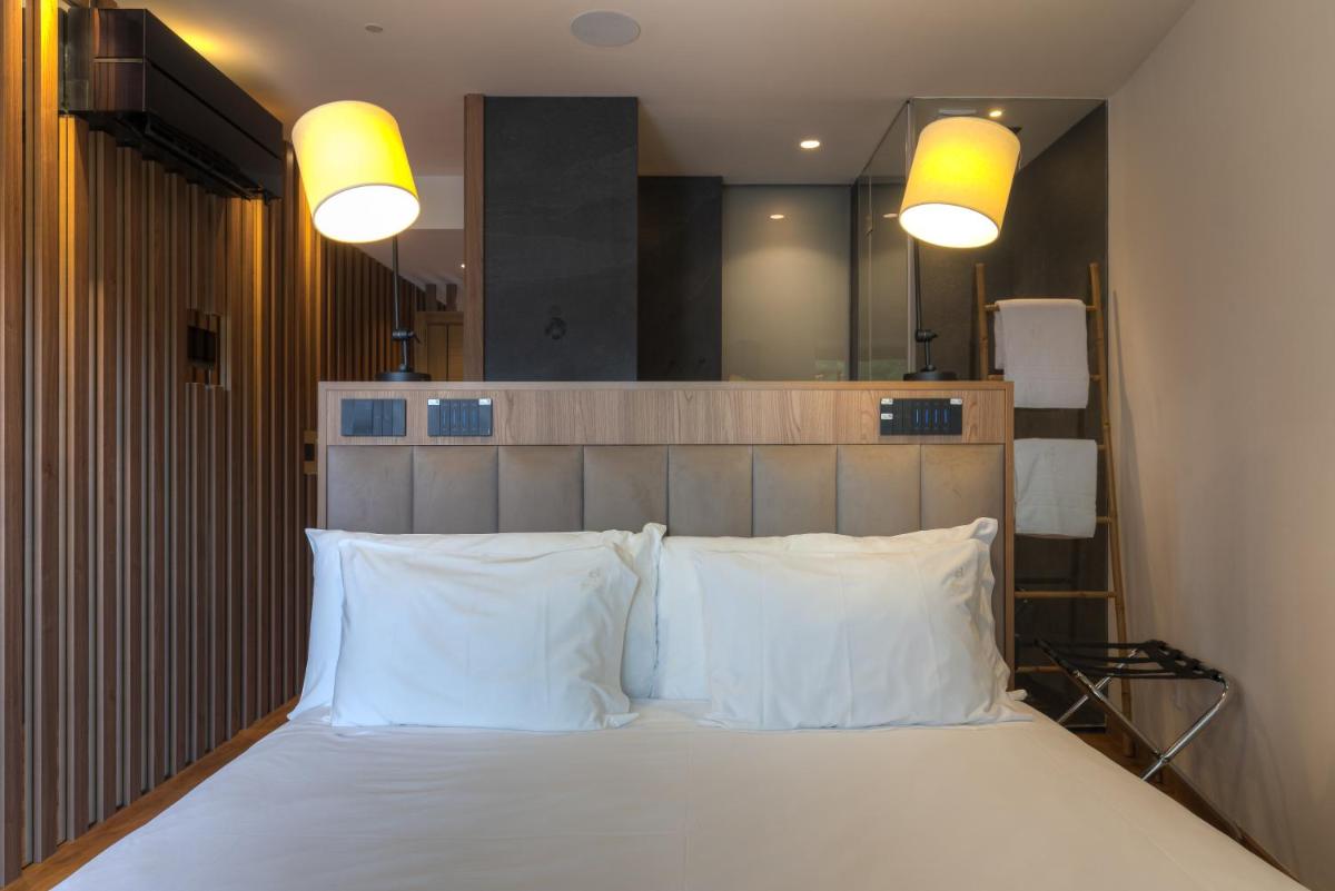 Uma cama ou camas num quarto em Hotel Rural Vale Do Rio