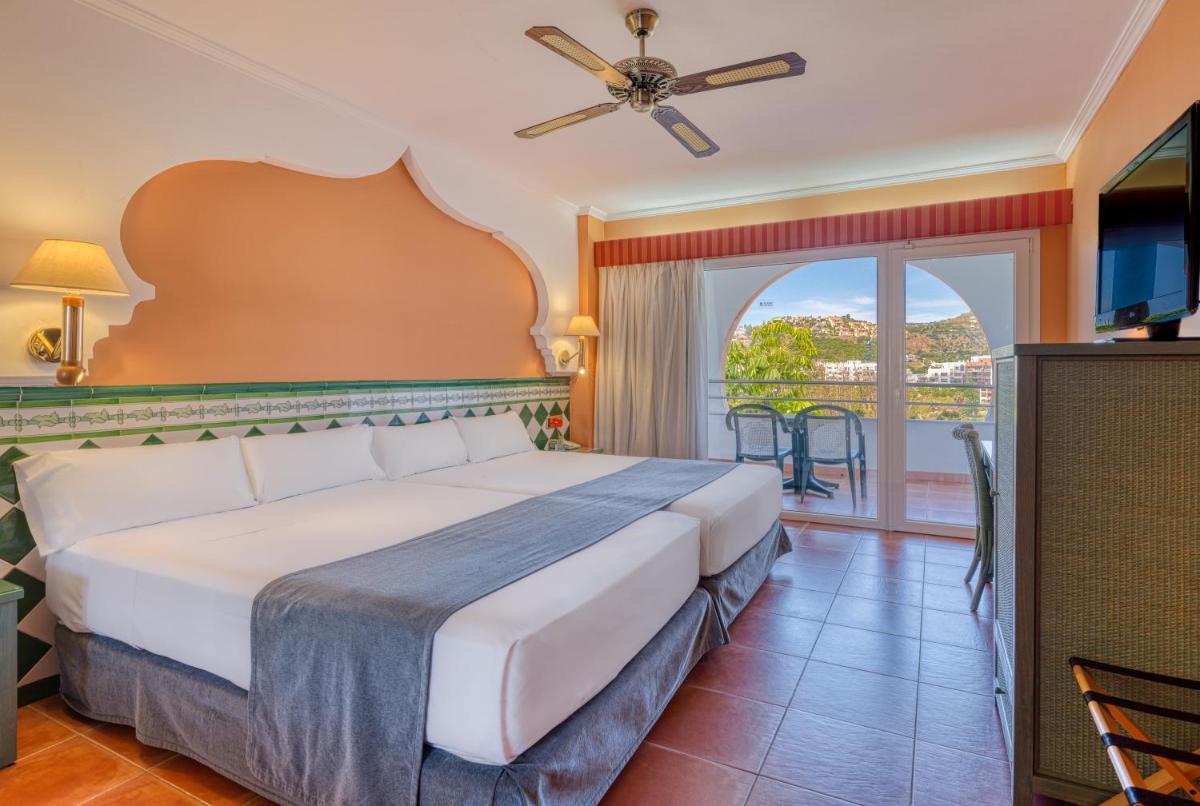 Cama o camas de una habitación en Playacálida