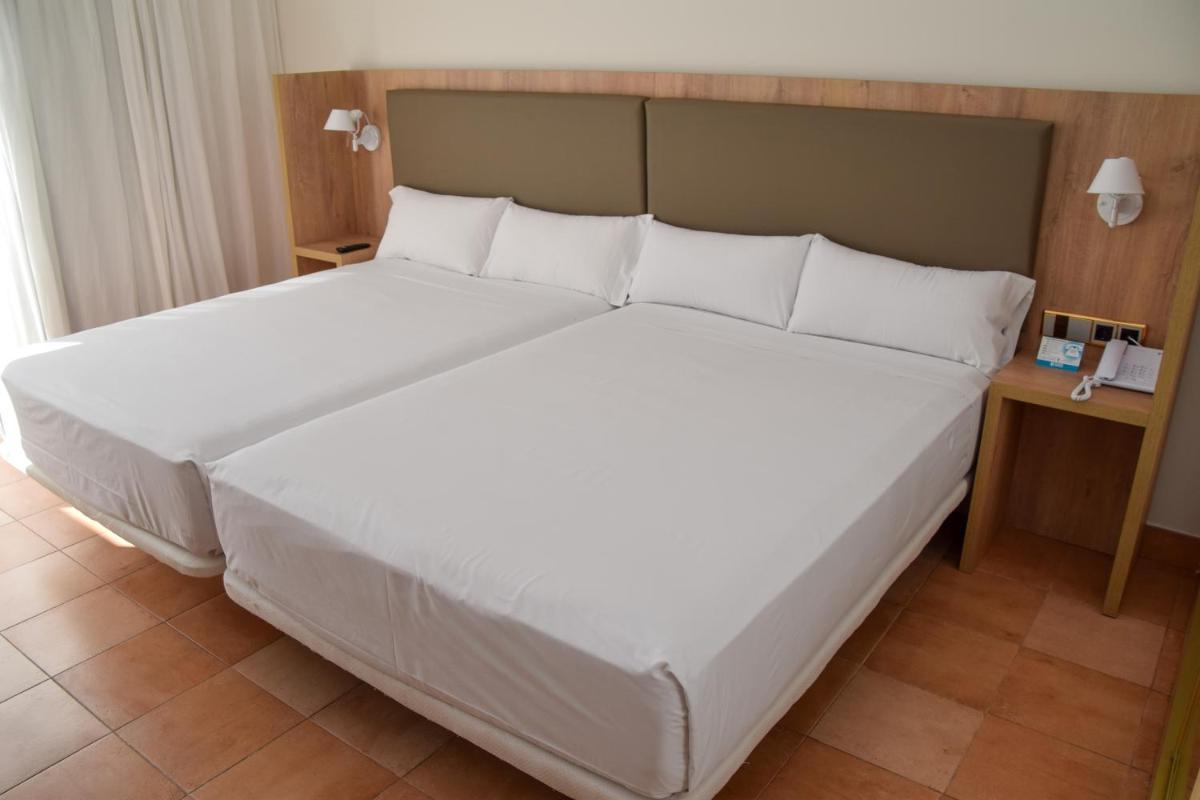 Cama o camas de una habitación en Playaballena