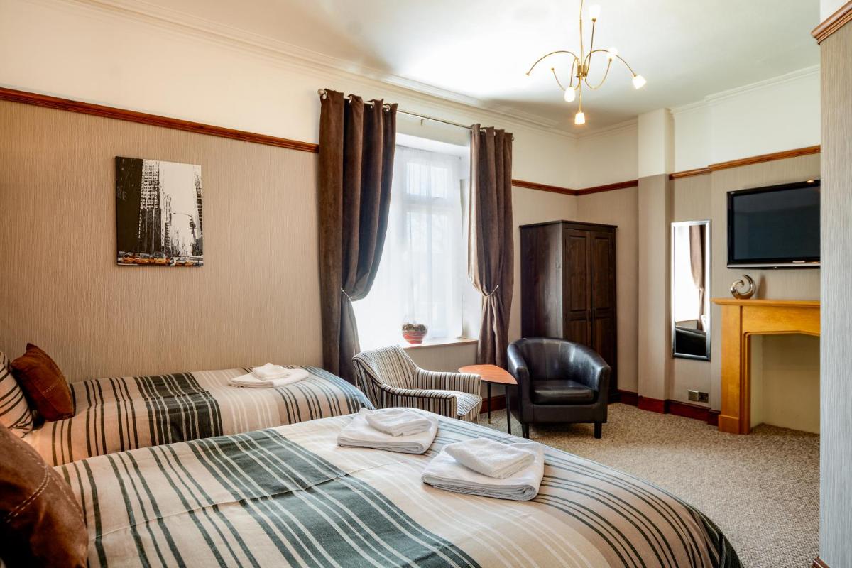 Tanes Hotel - Housity