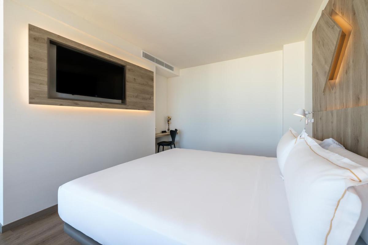 Cama o camas de una habitación en Senator Gandia