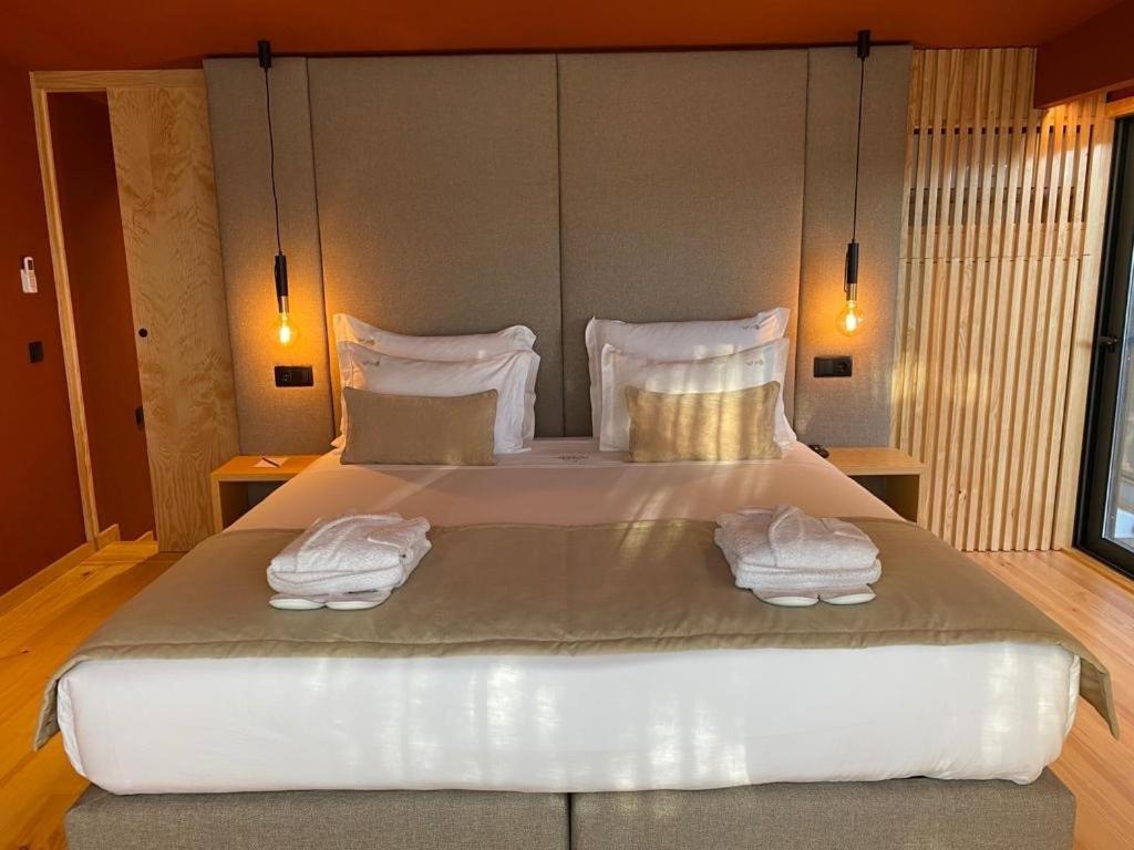 Uma cama ou camas num quarto em Quinta do Pedregal Hotel & Spa