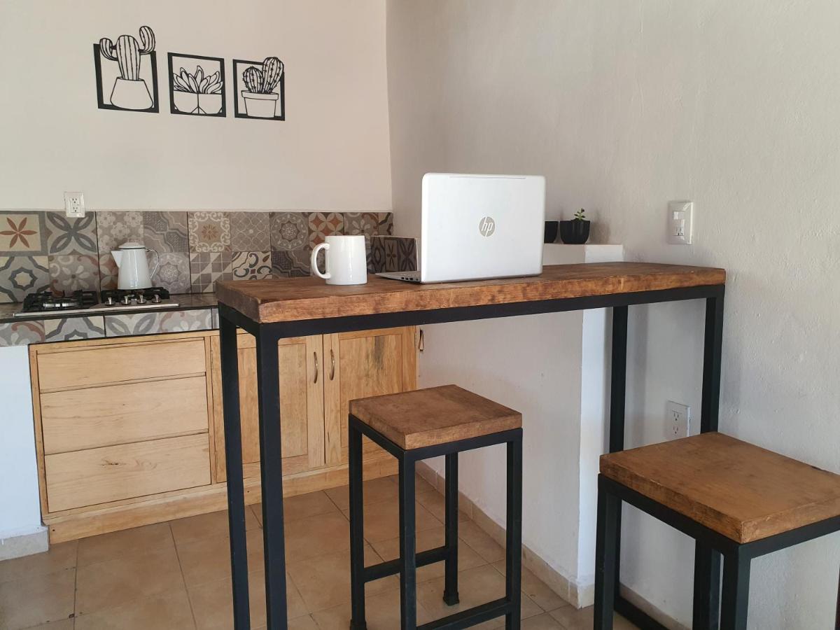 Suitetrails - Habitación con balcón privado en avenida principal