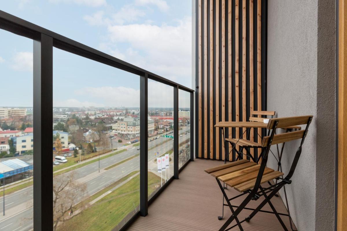 Elegancki Apartment z Parkingiem by Noclegi Renters - Housity