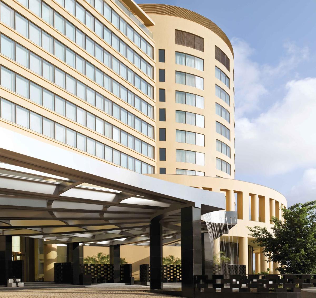 a rendering of the front of a hotel at Trident Bandra Kurla in Mumbai a rendering of the front of a hotel at Trident Bandra Kurla in Mumbai