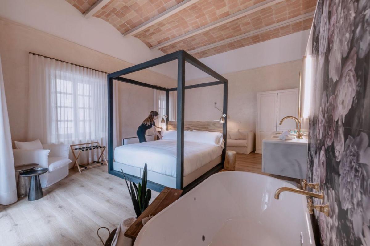 Cama o camas de una habitación en Hotel Palau Macelli & Spa