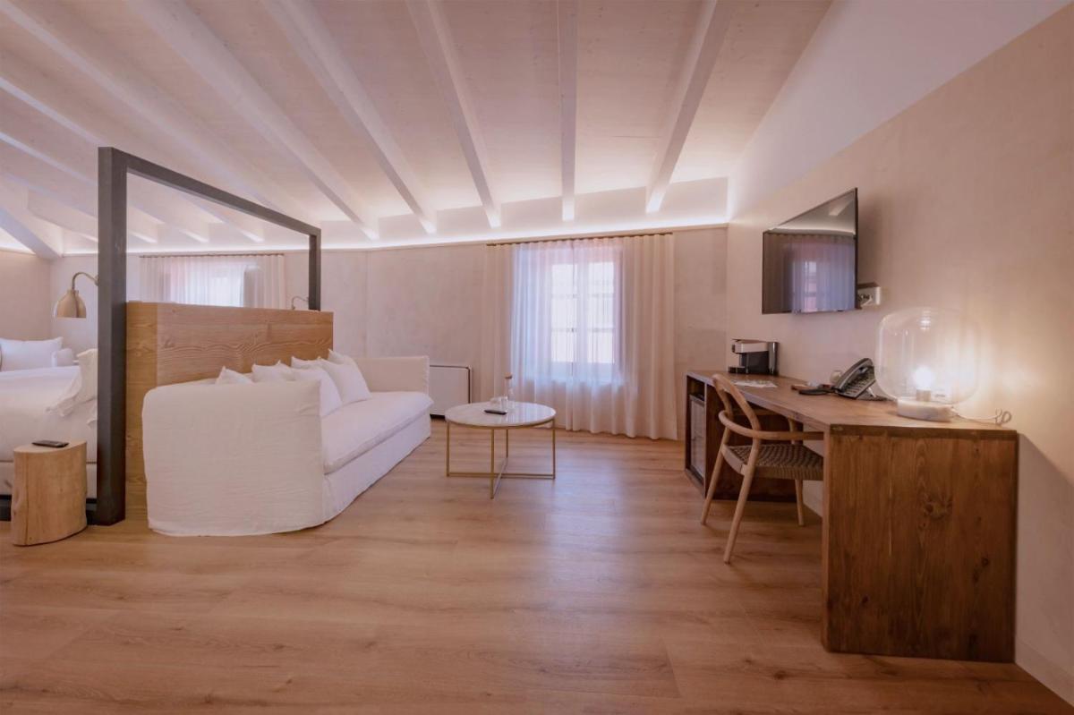 Cama o camas de una habitación en Hotel Palau Macelli & Spa