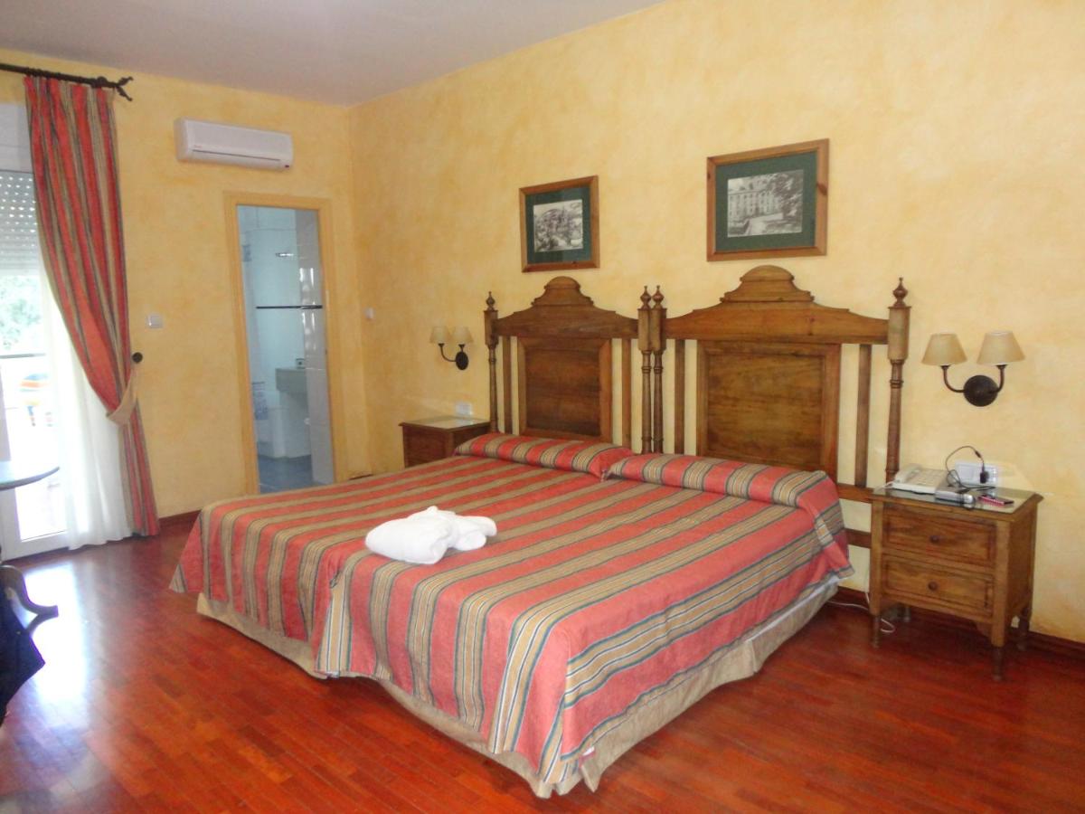 Cama o camas de una habitación en Balneario de Alhama de Granada