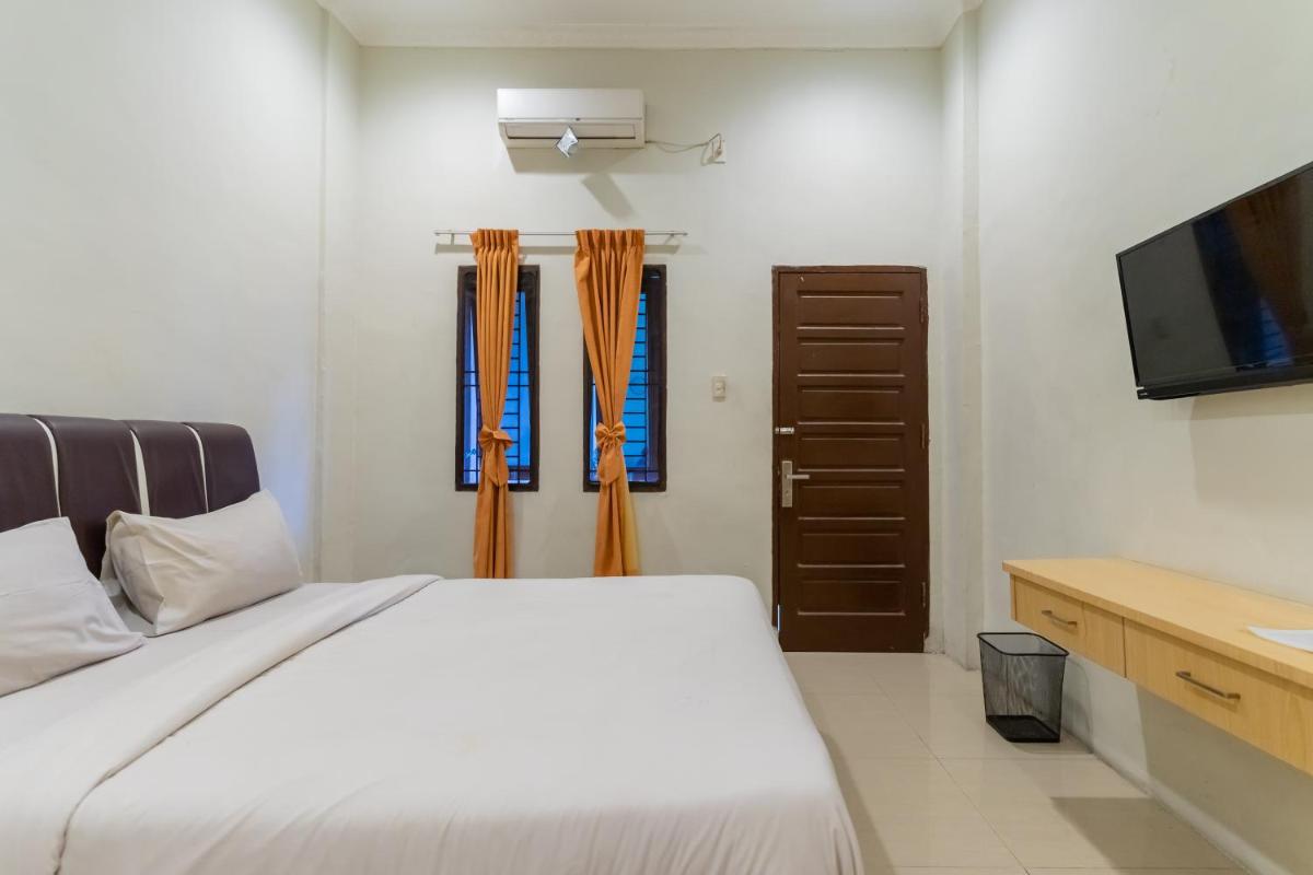Vandolia Guest House Mitra RedDoorz - Housity