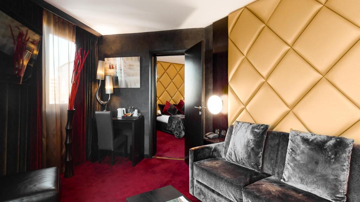 Coin salon dans l'établissement Hotel Palladia