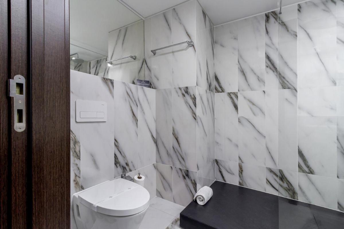 Uma casa de banho em In Gold Hotel & Spa