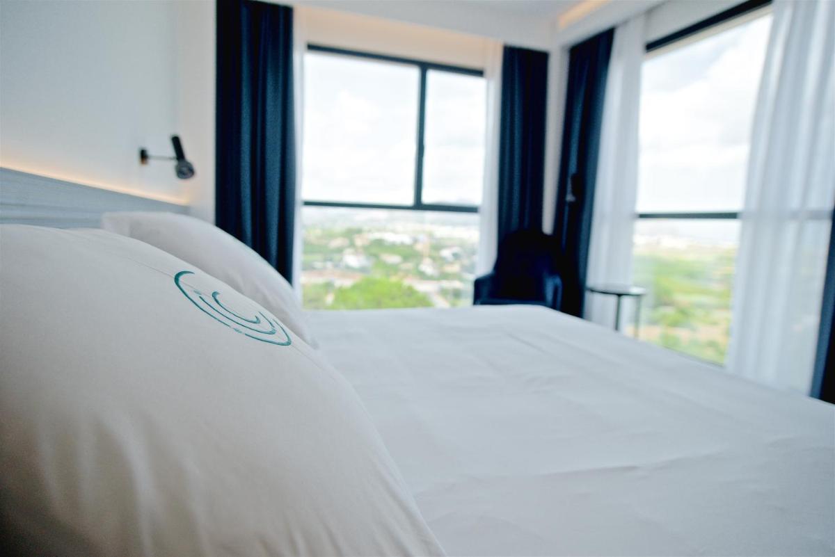 Cama o camas de una habitación en Syncrosfera Fitness & Spa Health Hotel Boutique