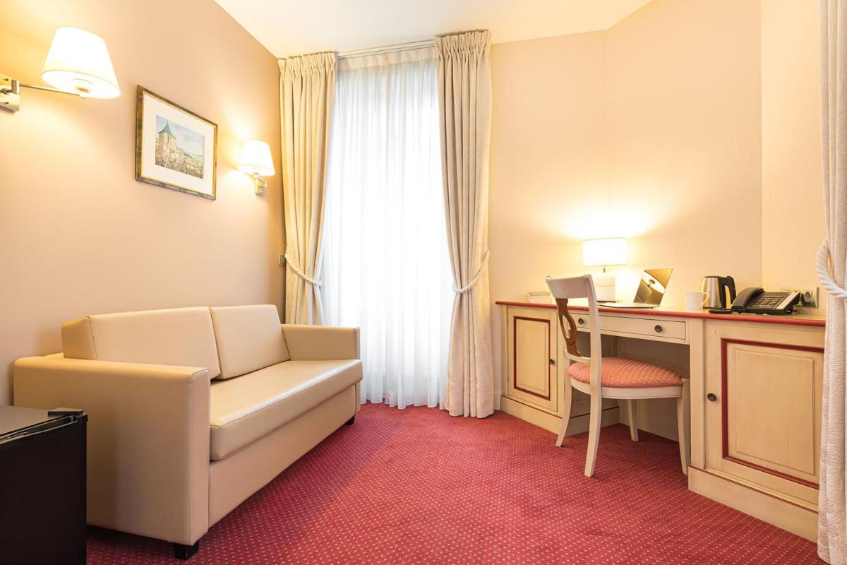 Coin salon dans l'établissement Hôtel Spa Thermalia