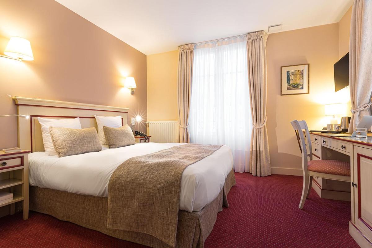 Un ou plusieurs lits dans un hébergement de l'établissement Hôtel Spa Thermalia