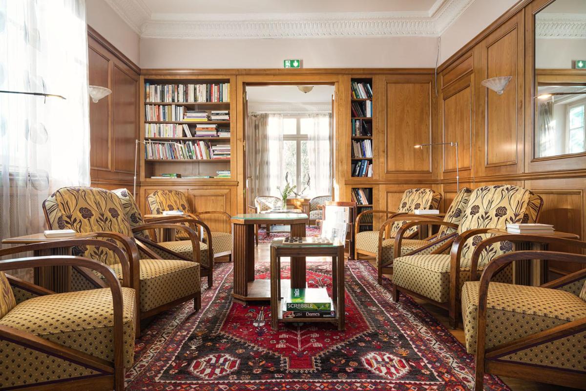 Coin salon dans l'établissement Hôtel Spa Thermalia