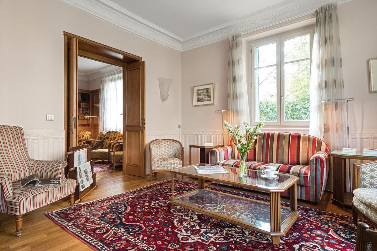 Coin salon dans l'établissement Hôtel Spa Thermalia