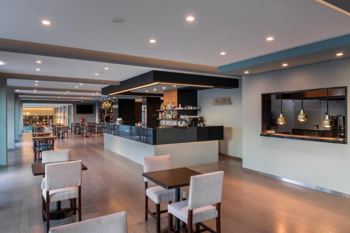 A área de bar ou lounge em Enotel Magnólia
