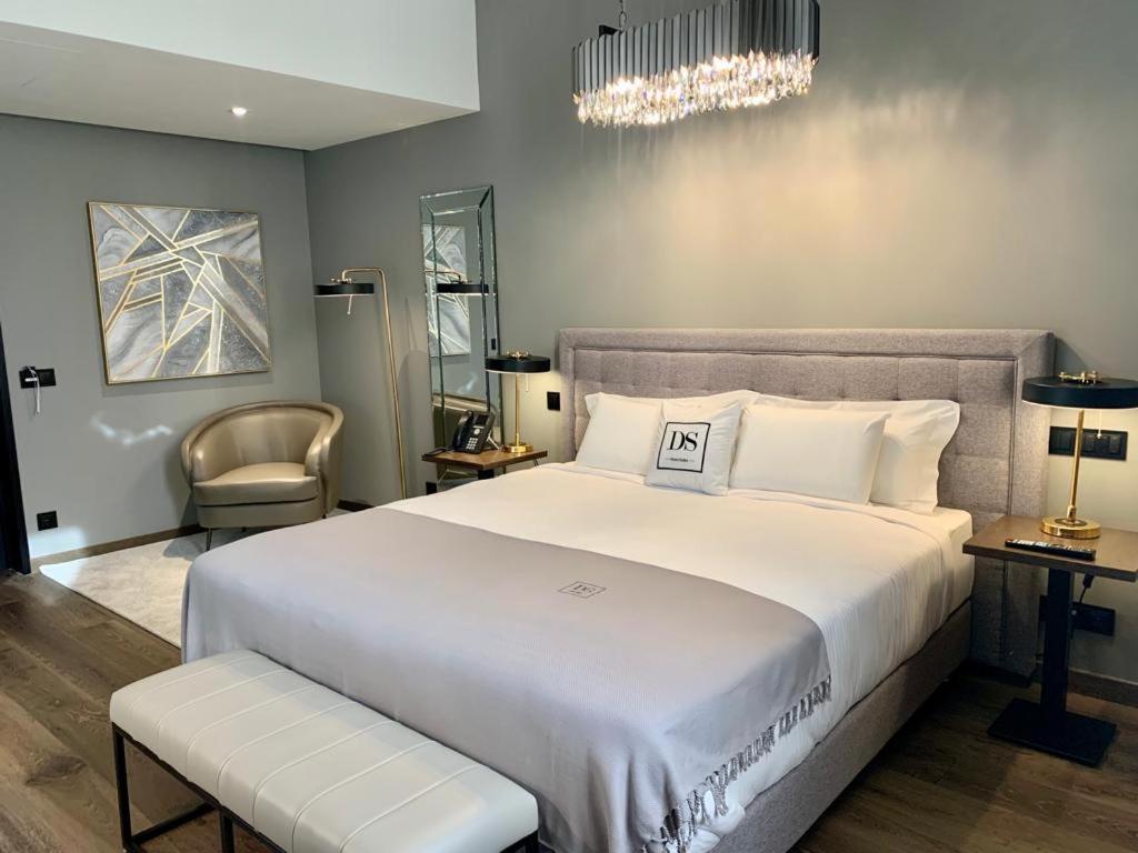 Uma cama ou camas num quarto em DS Hotel Lusopark