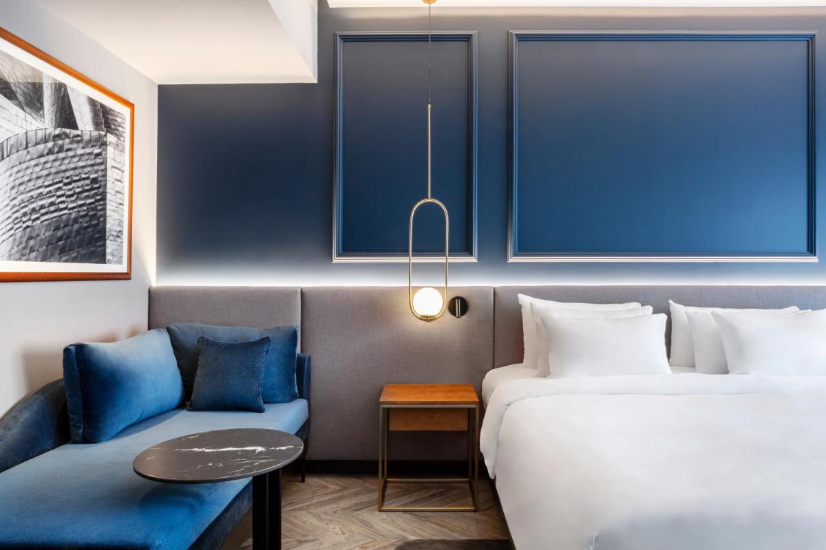 Cama o camas de una habitación en Radisson Collection Bilbao