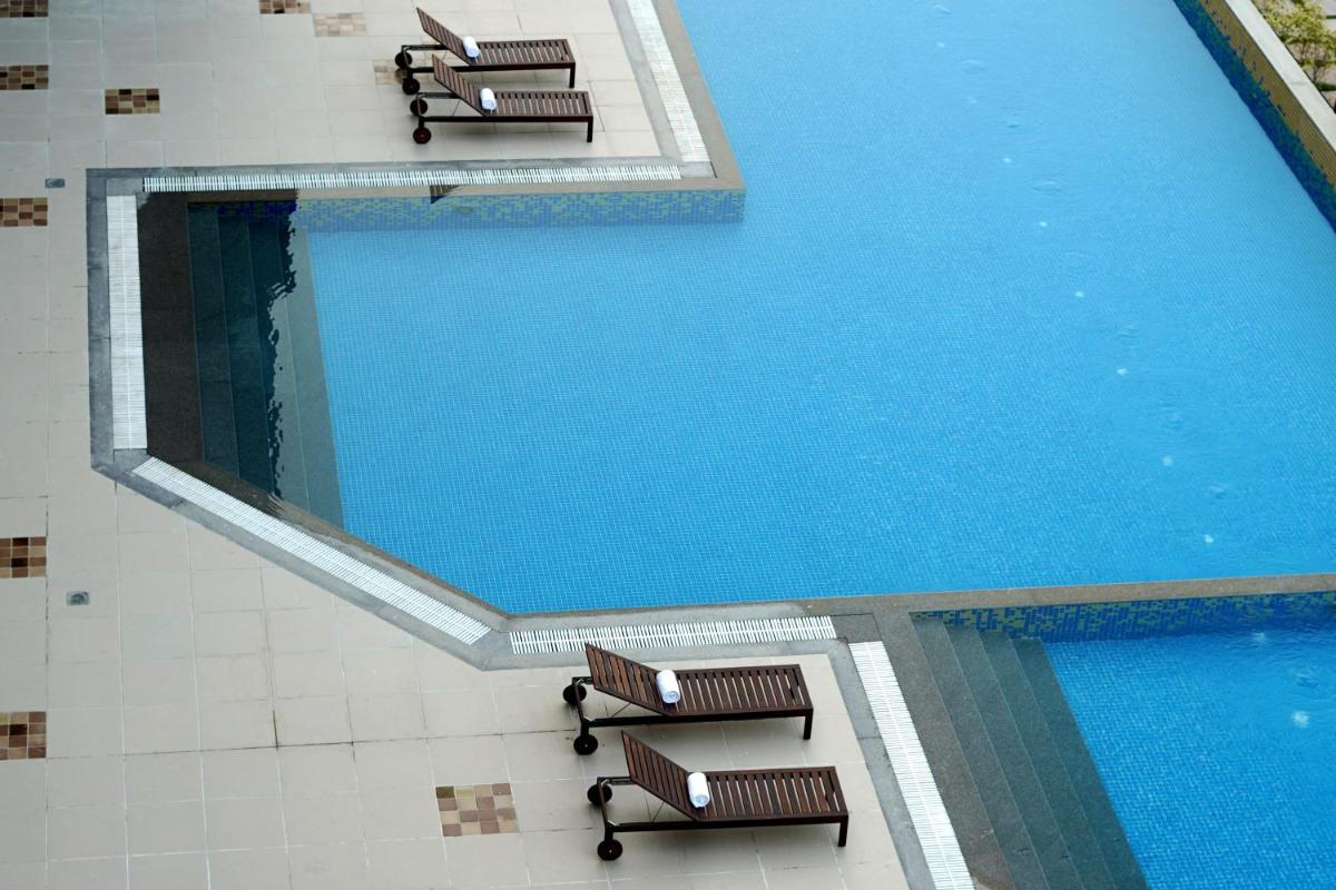 an overhead view of a swimming pool in a hotel at The Centrum in Lucknow