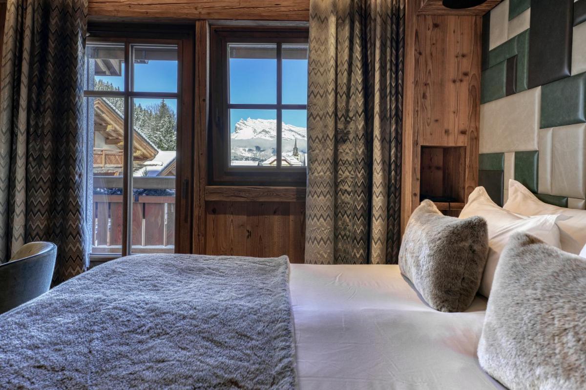 Un ou plusieurs lits dans un hébergement de l'établissement Armancette - The Leading Hotels of the World