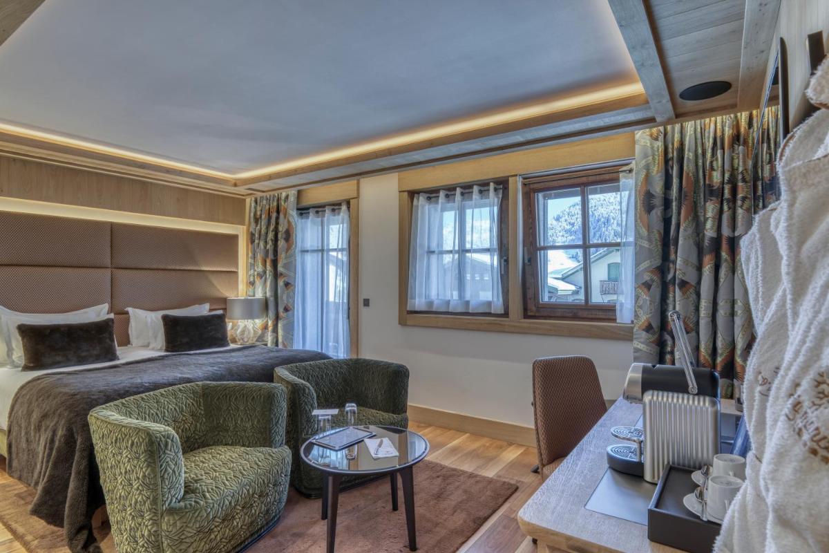 Un ou plusieurs lits dans un hébergement de l'établissement Armancette - The Leading Hotels of the World