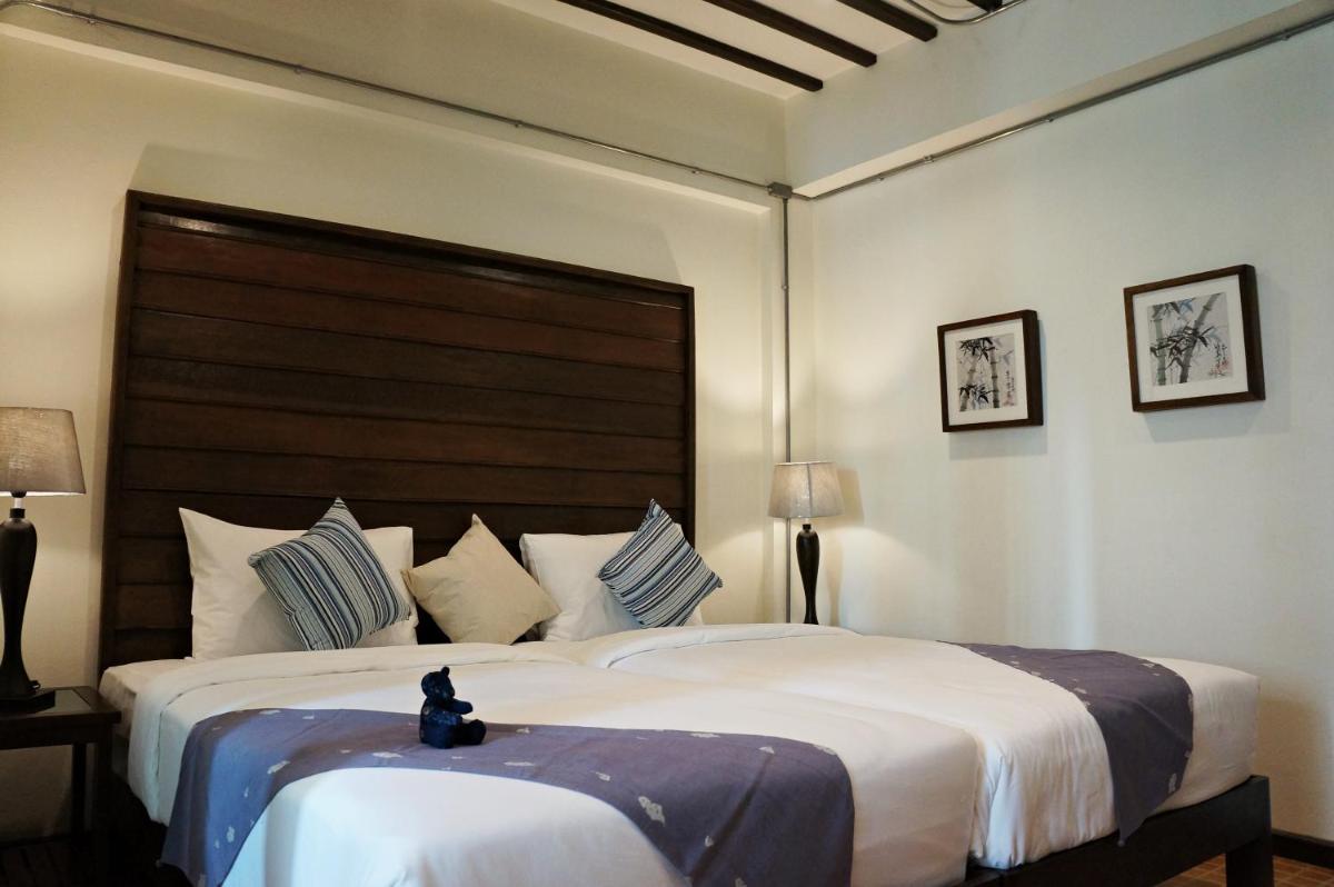Kampaeng Ngam Hotel - Steps to Night Bazaar & Old City - Housity
