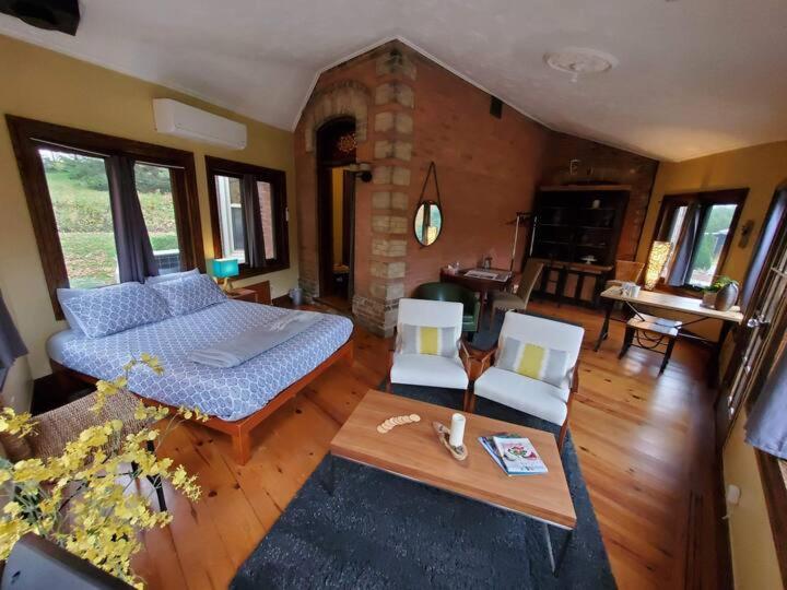 Suitetrails - The Front Porch Room of a 140-Year-Old Victorian House
