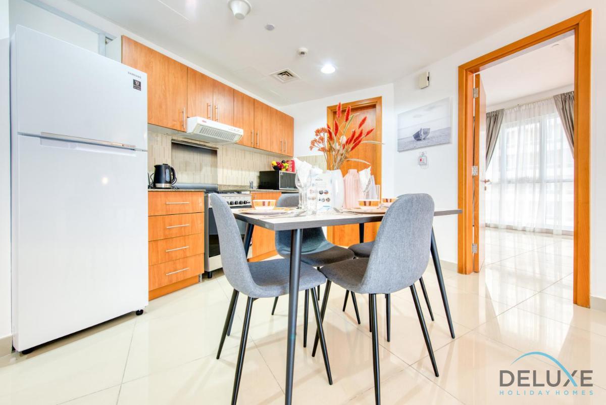 Calm 1BR at Lakeside Tower A Production City by Deluxe Holiday Homes - Housity