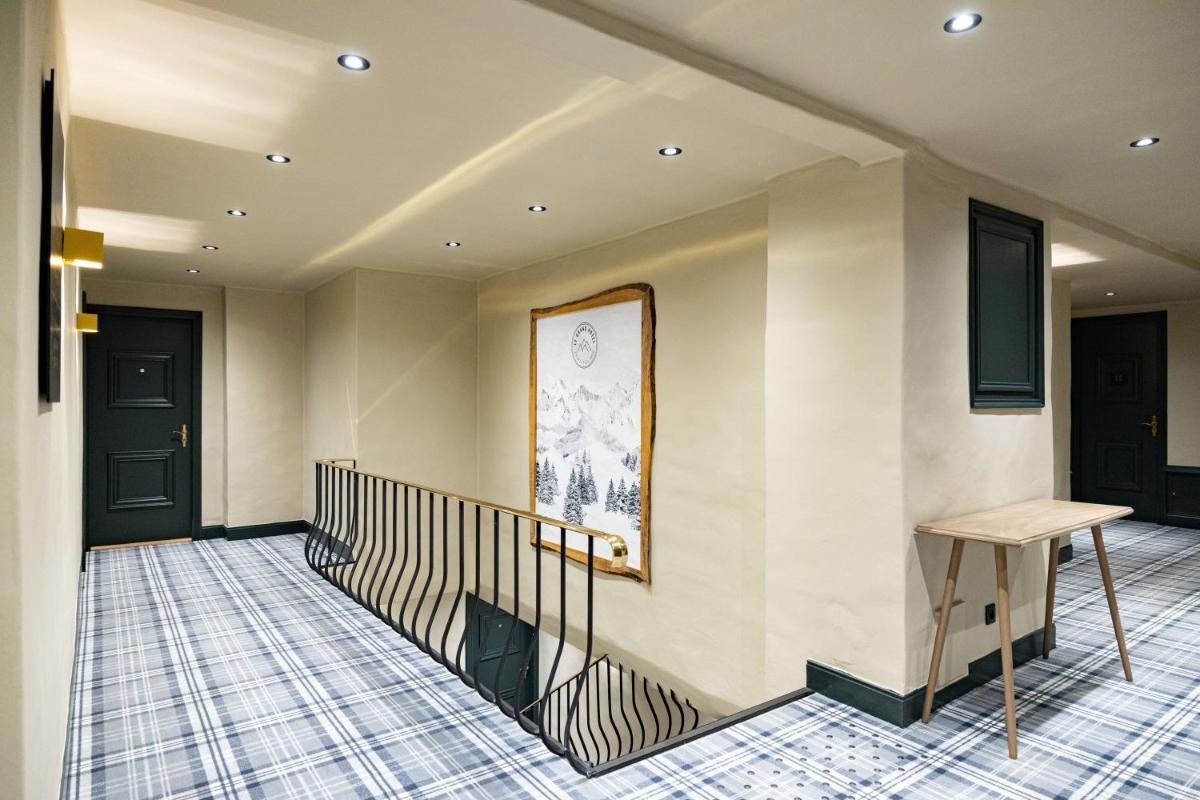 Coin salon dans l'établissement Grand Hôtel Courchevel 1850