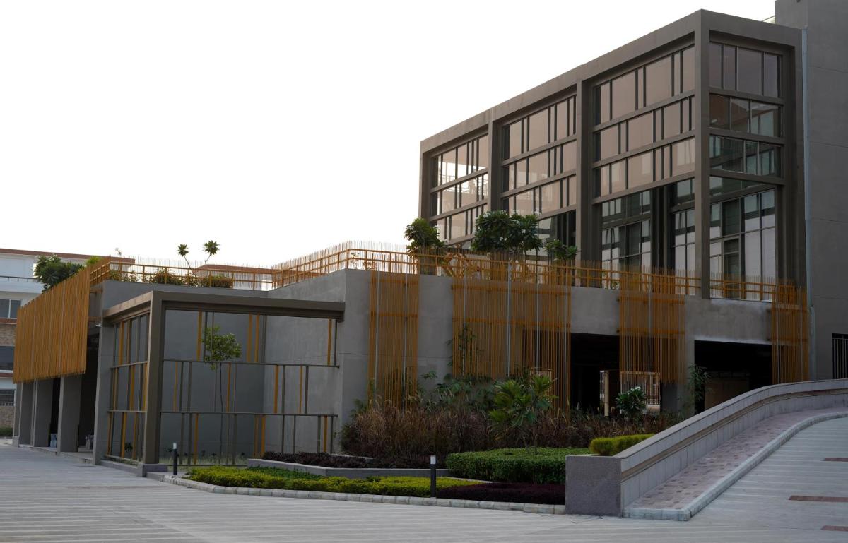 a large building with a lot of windows at The Centrum in Lucknow
