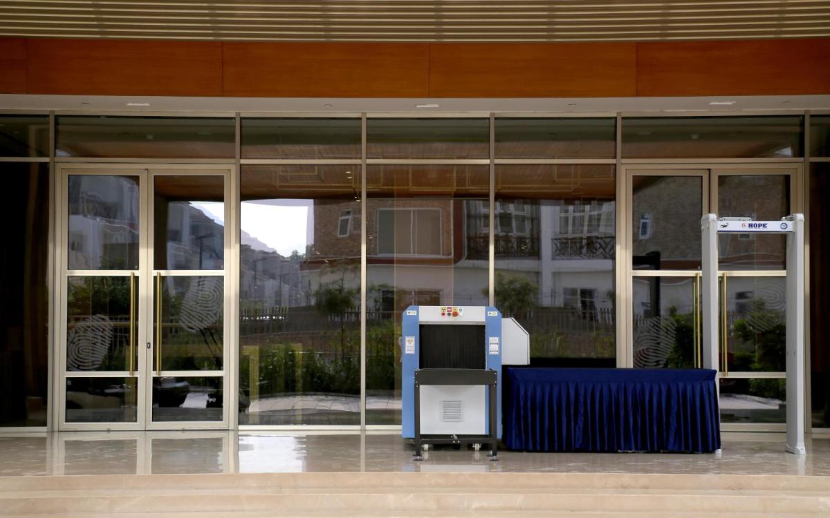 an atm machine in front of a building at The Centrum in Lucknow