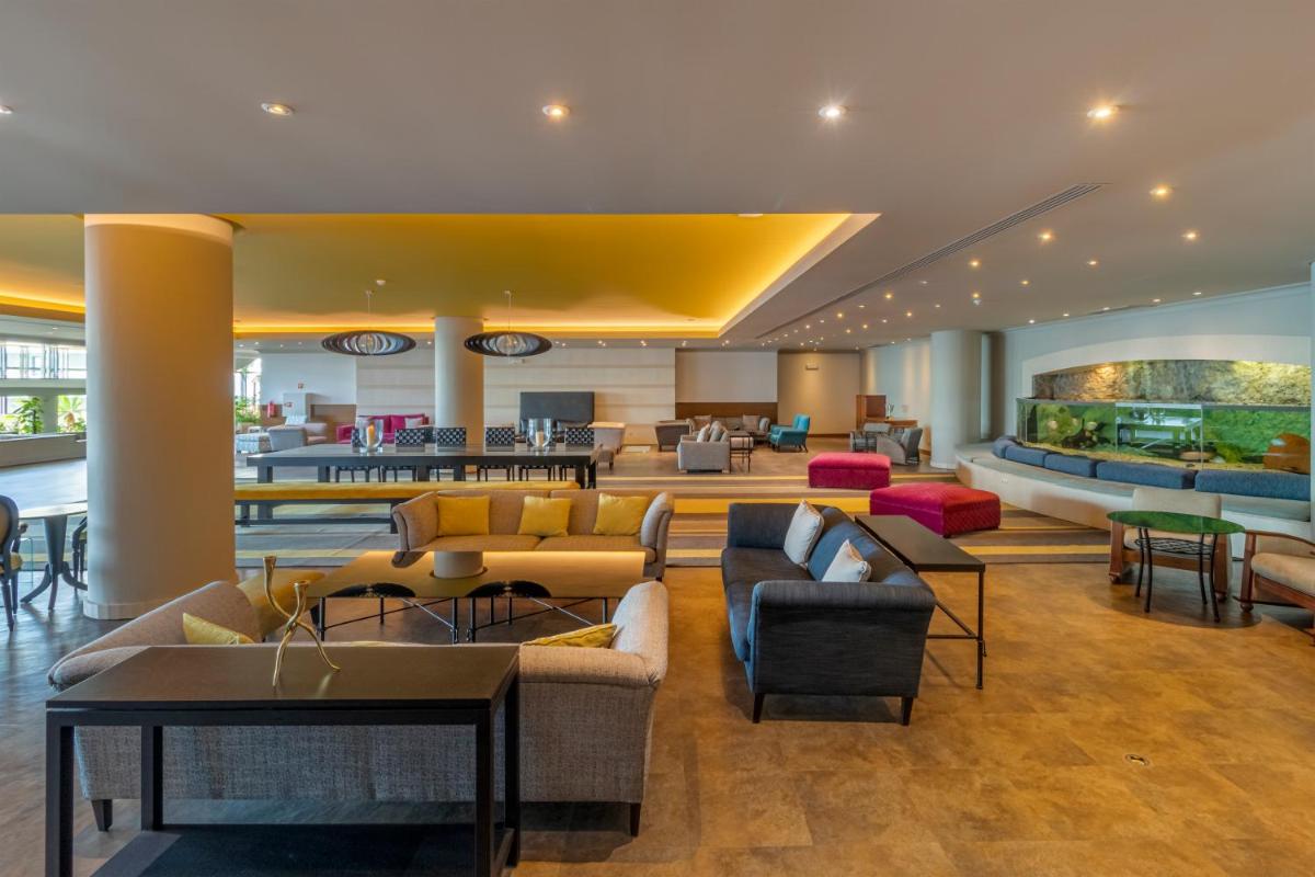 Uma área de estar em Enotel Lido - All Inclusive