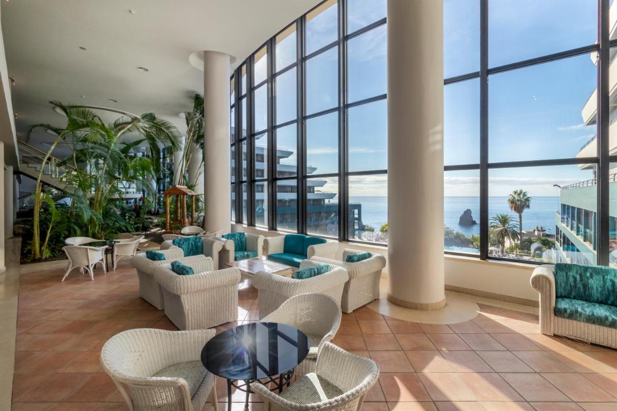 Uma área de estar em Enotel Lido - All Inclusive